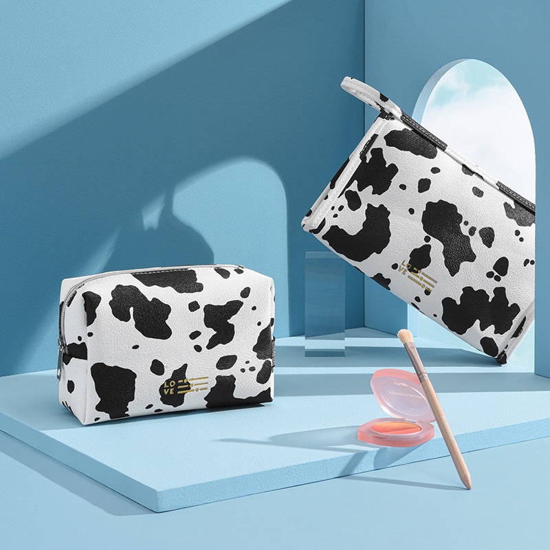 Wholesale Portable Storage Waterproof PU Cow Pattern Makeup Bag